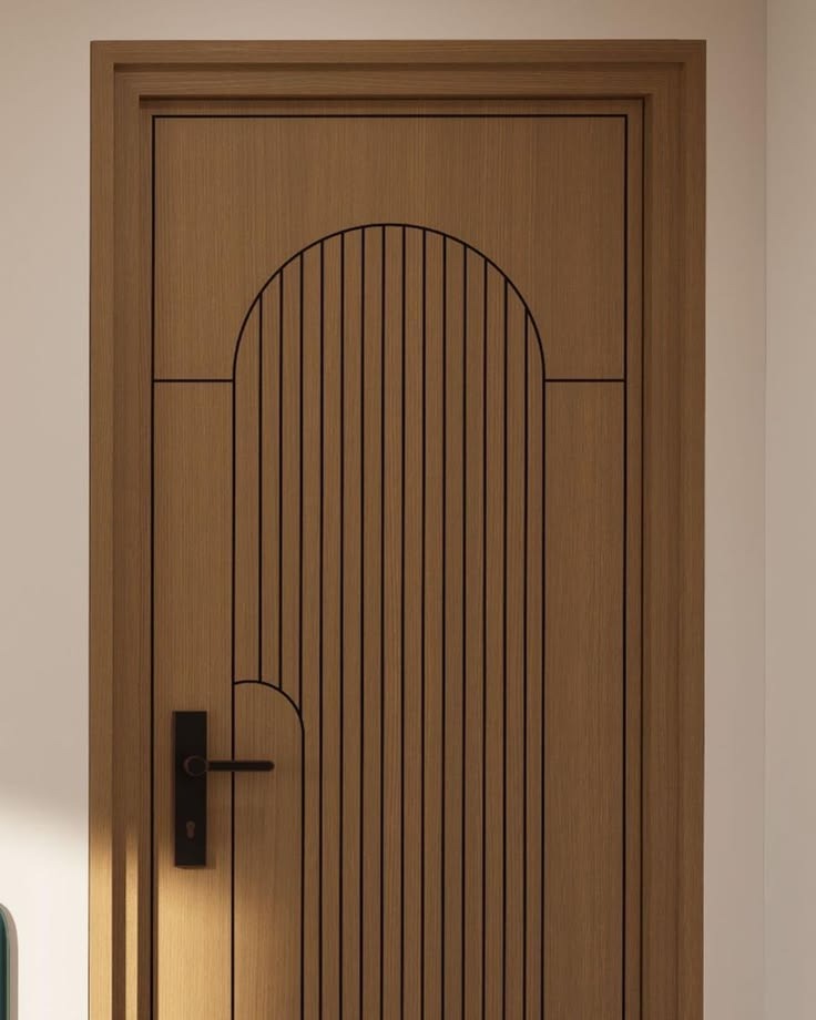 Oak interior door with arched groove pattern and black inlay lines